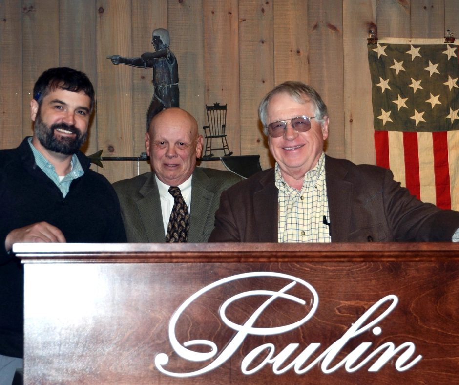 Nick Poulin, Steve Poulin, and James D. Julia at the auction block during our Spring 2022 Premier Firearms Auction